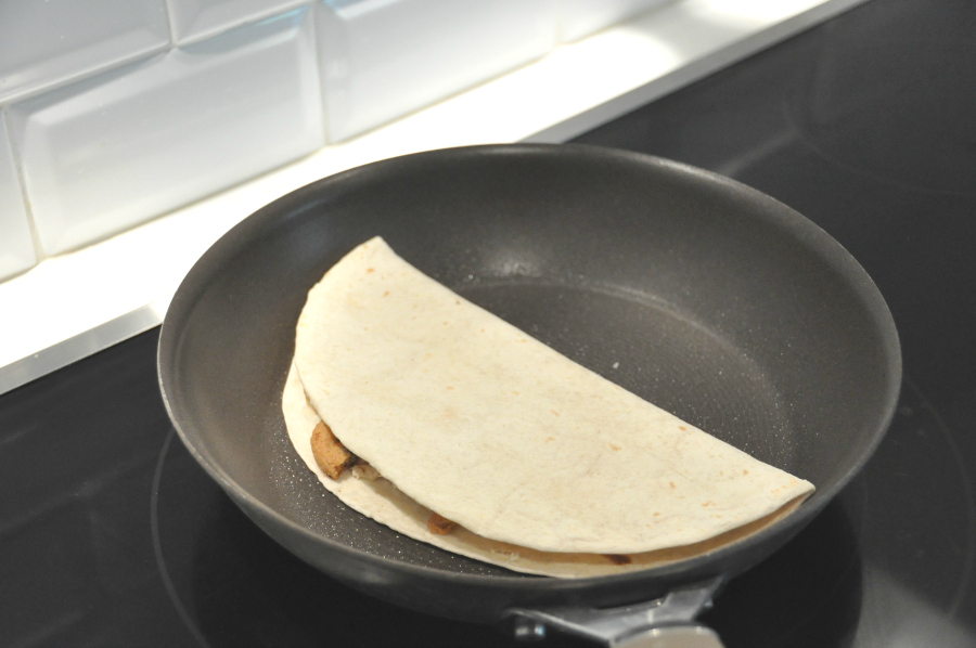 Dia del niño! Sweet Plantain Quesadilla Recipe #ConMasSabor toast quesadilla on lightly oiled pan