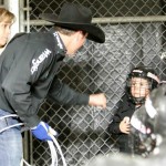 Getting a pep talk from a cowboy at the san antonio rodeo