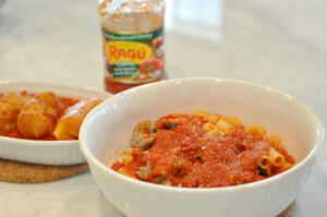 Baked Ziti and Fried Cheese Recipe Ragu Pasta Sauce Recipes #simmeredintradition #ragu Bowl of baked ziti with Ragu