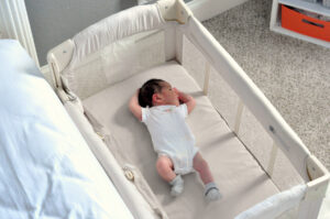 Getting Some Rest With A Newborn - Miesha sleeping in the Arms Reach Co Sleeper
